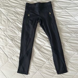 Lululemon Size 4 black leggings with zipper pockets